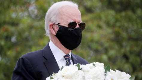 Biden wears the sunglasses when out in the sun. Is that you, Joe? Biden's mask-sunglasses combo covers ...