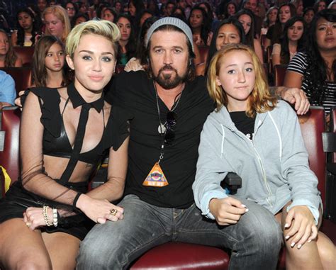 Wow Miley Cyrus Younger Sister Turns Heads At Amas E News