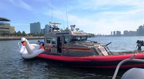 Fdny Rescues Distressed Swan Floaters In East River