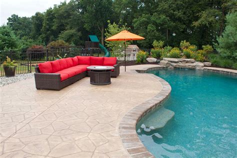 Stamped Concrete Around Pools Enhancing Your Pool Area With Style