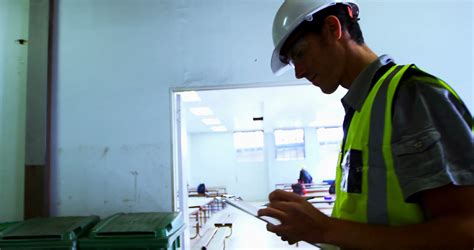 Male Engineer Maintaining Stocks In Workshop K Stock Video Footage Sbv