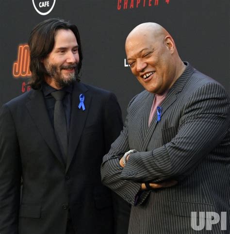 Photo Keanu Reeves And Laurence Fishburne Attend The John Wick