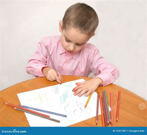 Boy With Coloured Pencils Stock Image Image Of Backgrounds 12471497