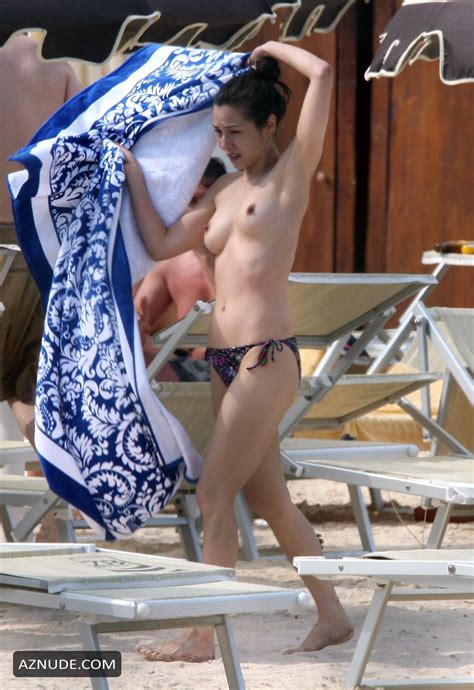 China Chow Goes Topless At The Beach While Vacationing In