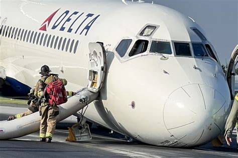 delta flight makes emergency landing in n c without nose gear after malfunction