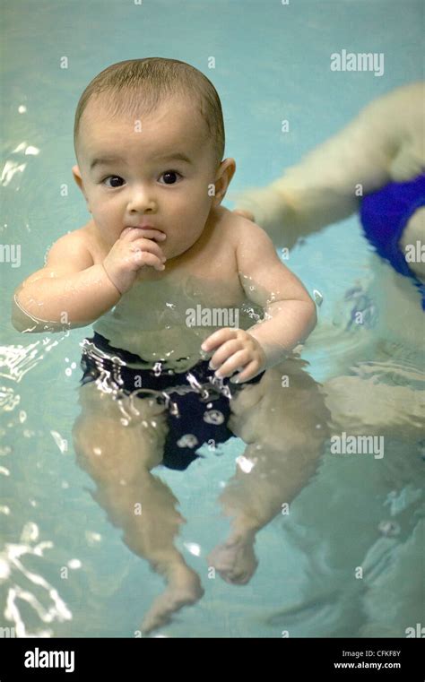 Baby Boy In Swimming Pool Stock Photo Alamy