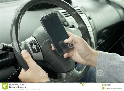Driving With A Mobile Phone In Hand Stock Photo Image Of Horizontal