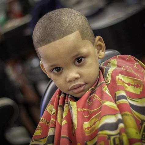 With its clean sides and back, it leaves plenty of room to play around. 60 Easy Ideas for Black Boy Haircuts - (For 2020 Gentlemen)