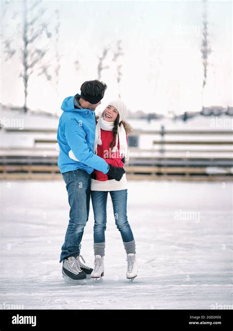 Ice Skating Winter Activity Couple In Love Having Fun Learning To