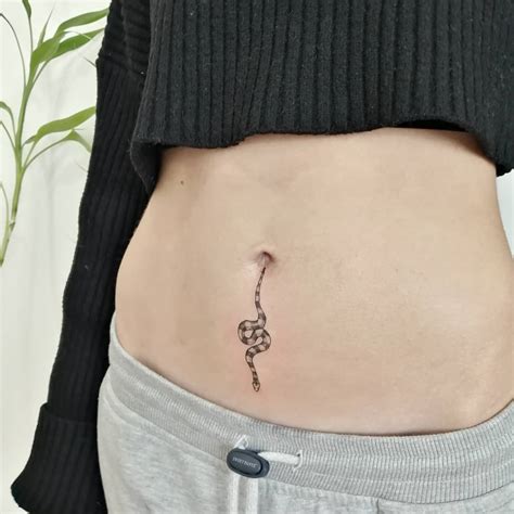 Funny Bellybutton Tattoo