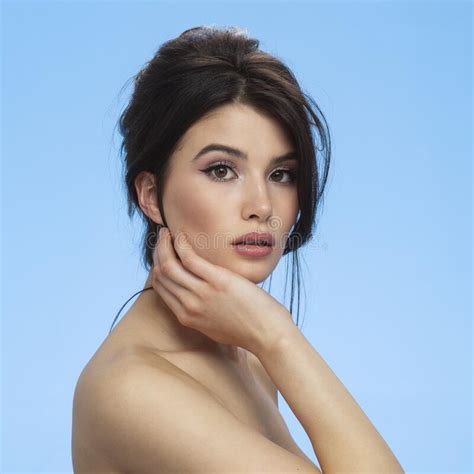 Closeup Beauty Portrait Of A Brunette With Naked Shoulders With Makeup