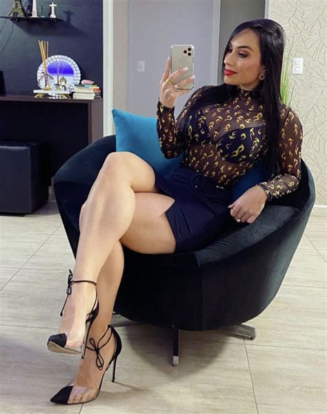 Woman In High Heels Taking A Selfie