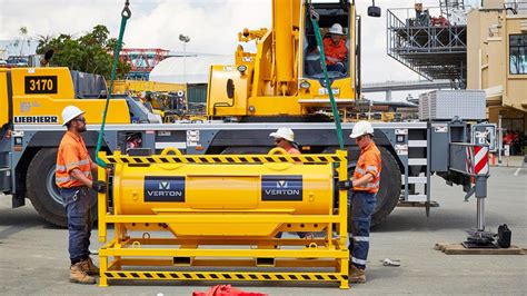A crane or arm at trackside in a railroad station for pouches of mail consigned to or left by moving trains. Brisbane company Verton is making cranes safer | The ...