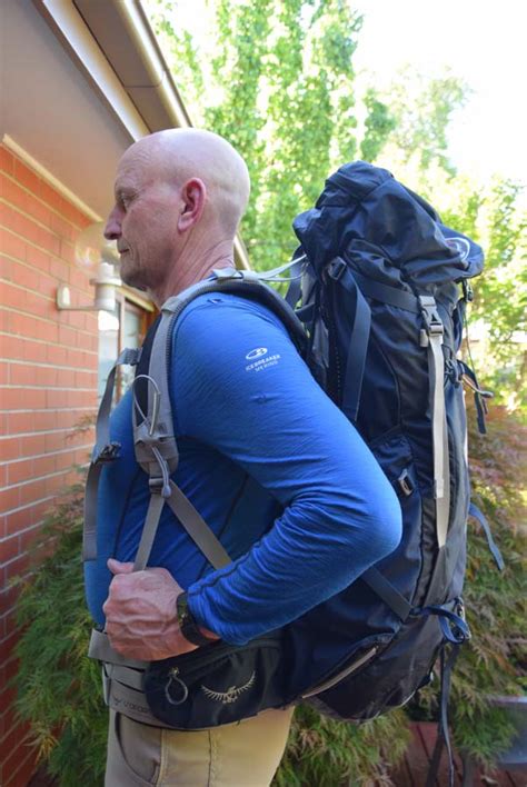 Australian Hiker Fitting A Backpack