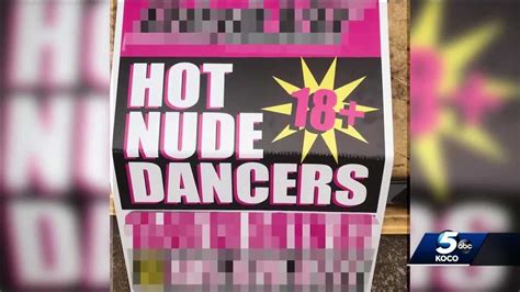 signs advertising strip clubs popping up near moore neighborhoods schools