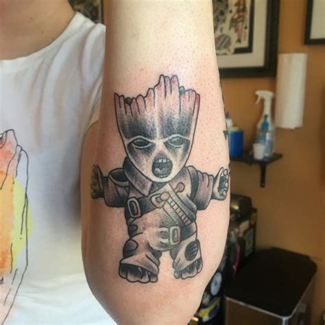 Pretty on the outside, tough also on the outside. Raging Baby Groot tattoo! | Groot tattoo, Tattoos, Baby groot tattoo