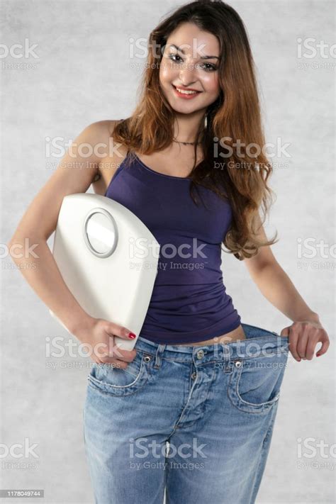 Young Beautiful Athletic Girl Shows How Much Weight She Lost Stock