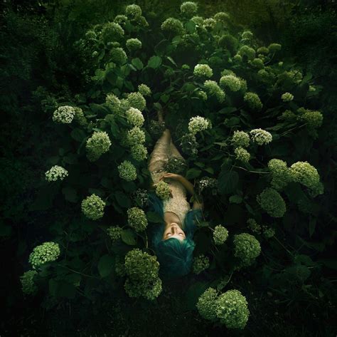 Enchanting Portraits Of Women Surrounded By Beautiful Blossoms