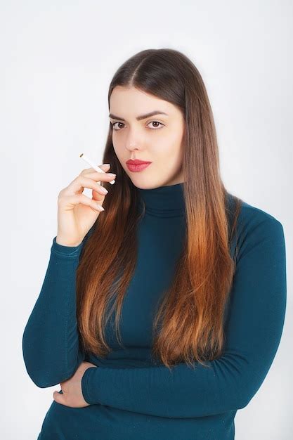 Premium Photo Beautiful Woman Holding Broken Cigarette