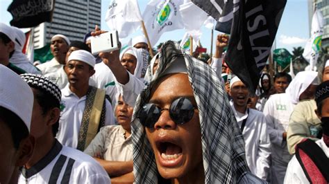 hard line islamist groups meet official popular roadblocks in indonesia