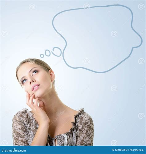 Close Up Portrait Of Dreaming Girl Isolated Over Blue Background With