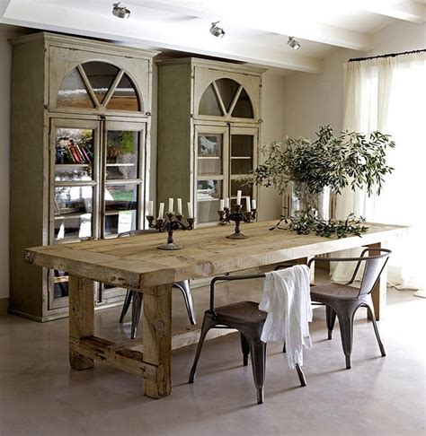 Start with a rustic farmhouse table complete with raw wood grain and distressing, and add variety seating to the mix. 47 Calm And Airy Rustic Dining Room Designs | DigsDigs