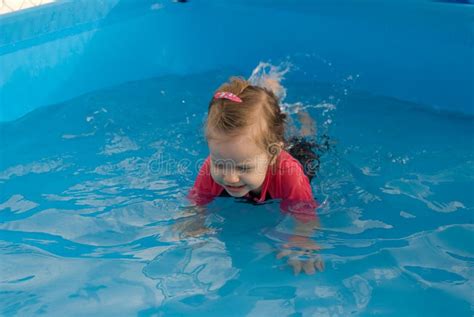 The Baby Girl Swiming In Pool Stock Image Image Of Action Relaxation