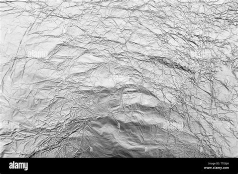 Silver Crumpled Foil Background Stock Photo Alamy