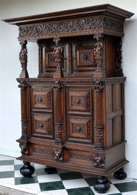 An Old Wooden Cabinet Sitting On Top Of A Checkered Floor