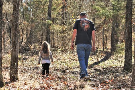 Man And Child Walking In Woods Free Stock Photo Public Domain Pictures