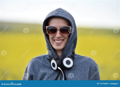 Hipster Girl In Hoodie Sunglasses And Headphones In The Outdoor Stock Image Image Of Hooligan