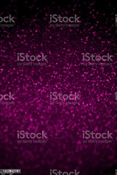 Abstract Red Glitter Confetti Sparkles On Black Background Stock Photo