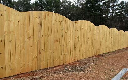 A pressure treated wood is often used for this purpose. Fence Pictures to help choose a style that is right for you
