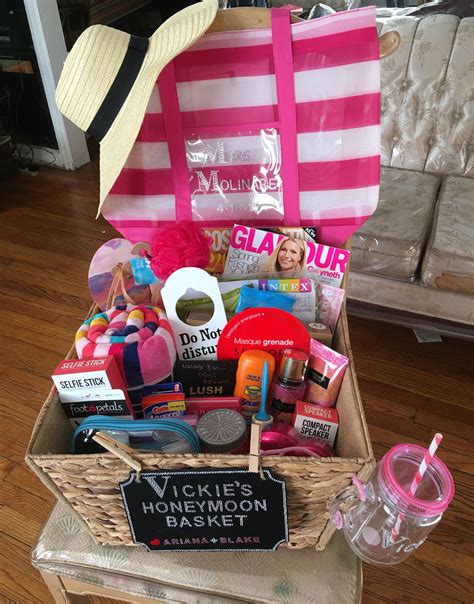 I had so much fun putting together this wedding gift basket for my sweet friend! Honeymoon Gift Basket | Honeymoon gifts, Honeymoon gift ...