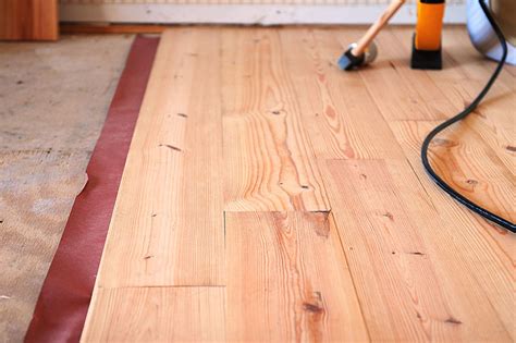 Tips and tutorials to lay down a pine floor for under $300, wood working do it yourself. Tips for DIY Hardwood Floors Installation | She Wears Many ...