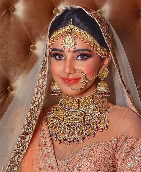 mãđhű for more pics follow indian bridal bridal makeup wedding bridal nose ring