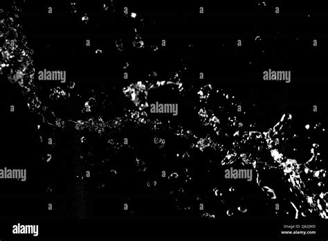 Water Splashes Isolated On Black Background White Jets With Drops