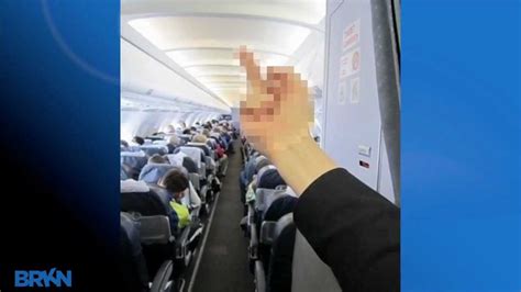Flight Attendant Fired For Middle Finger Pic Youtube