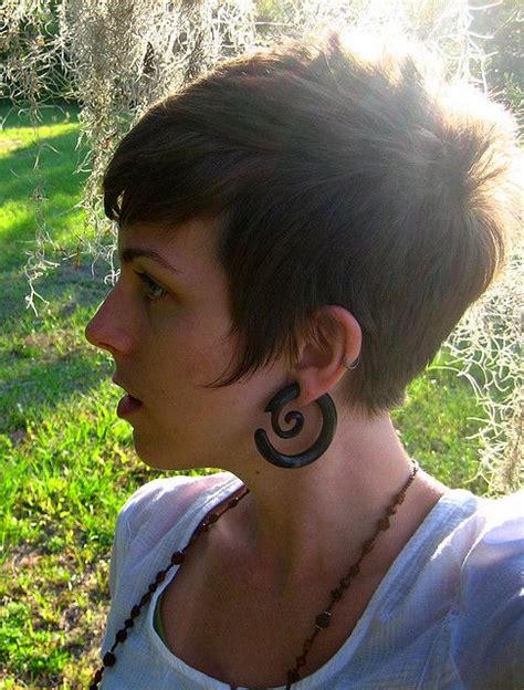 Layered pixie styles looks really nice with wipy bangs. Of the ear, The ear and Pixie cuts on Pinterest