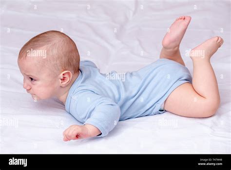 Child Laying On Stomach High Resolution Stock Photography And Images