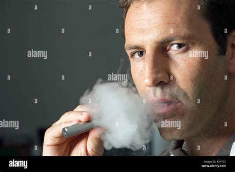 Man Smoking Electonic Cigarette Stock Photo Alamy