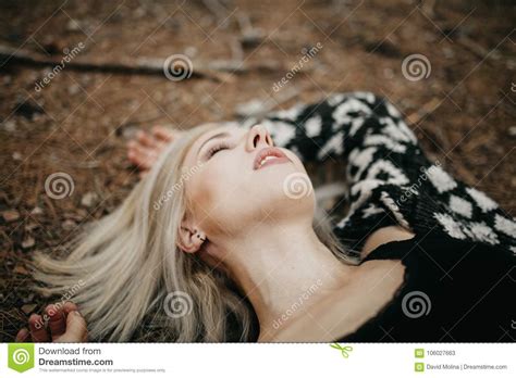 Cute Blonde Womann Lying Down On The Forest Ground Stock Image Image Of Blonde Girl 106027663