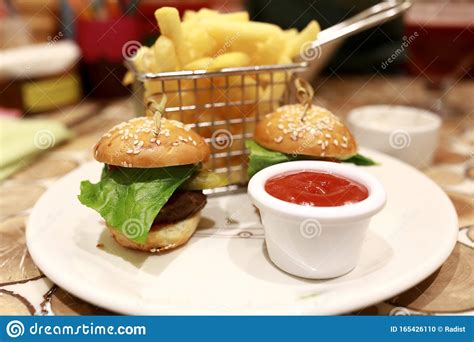 Burgers With French Fries And Ketchup Stock Photo Image Of Hamburger