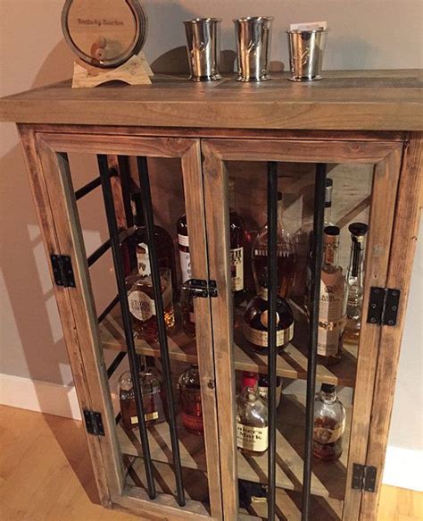 Maybe you would like to learn more about one of these? Liquor Cabinet, Rustic Iron and Wood with Natural ...