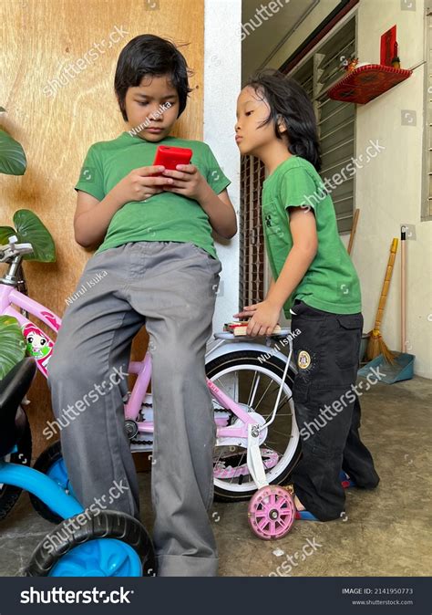 Asian Kids Playing Game Using Gameboy Stock Photo 2141950773 Shutterstock