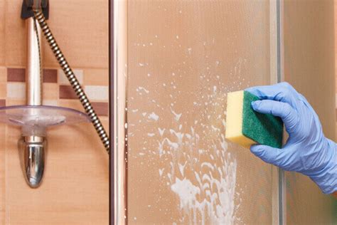 Let the paper towels sit for no more than 20 minutes, and if the towels dry out, rewet them with the solution. How To Clean Soap Scum in Tubs and Showers | Bright & Spotless