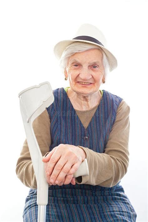 Disabled Senior Woman With Crutch Indoors Stock Image Image Of