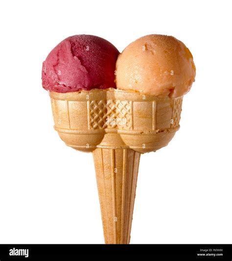 Cone With Two Scoops Of Ice Cream Blackcurrant And Melon Stock Photo