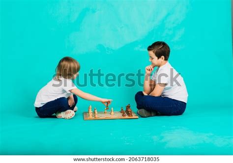 Two Boys Playing Chess Studio Background Stock Photo 2063718035