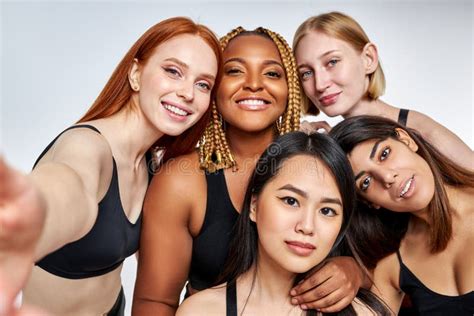 Portrait Of Friendly Interracial Group Of Women Models Posing At Camera Stock Image Image Of